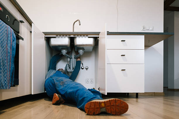 Professional Drain Cleaning technician working in Trenton, IL